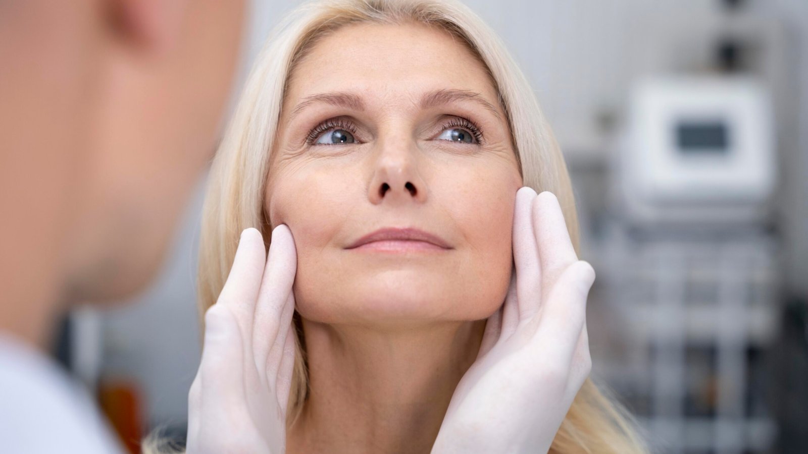 close-up-doctor-checking-smiley-woman