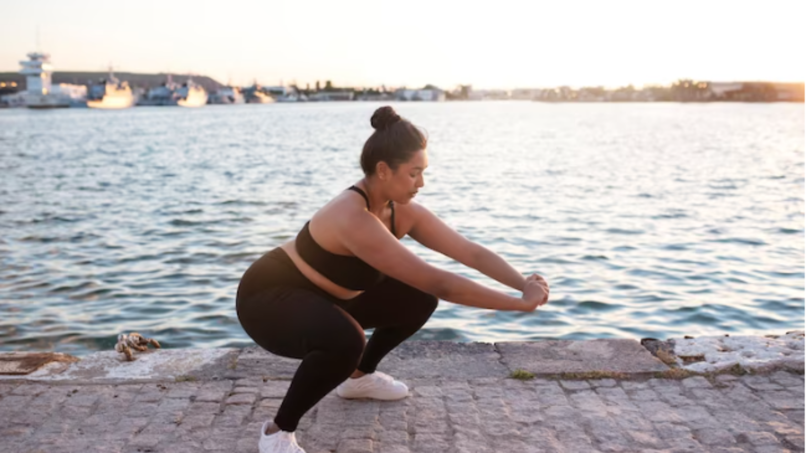 Free-Photo-Overweight-woman-exercising-outdoors-by-the-lake