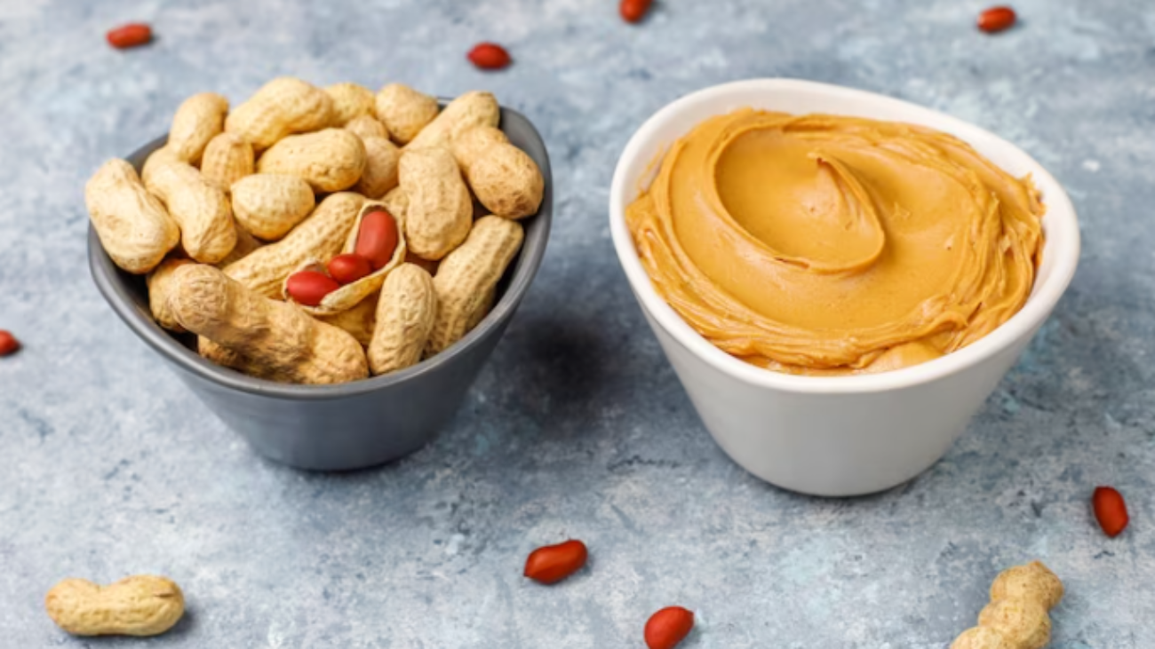 Free-Photo-Free-photo-homemade-peanut-butter-with-peanuts-on-grey-concrete-table-top-view