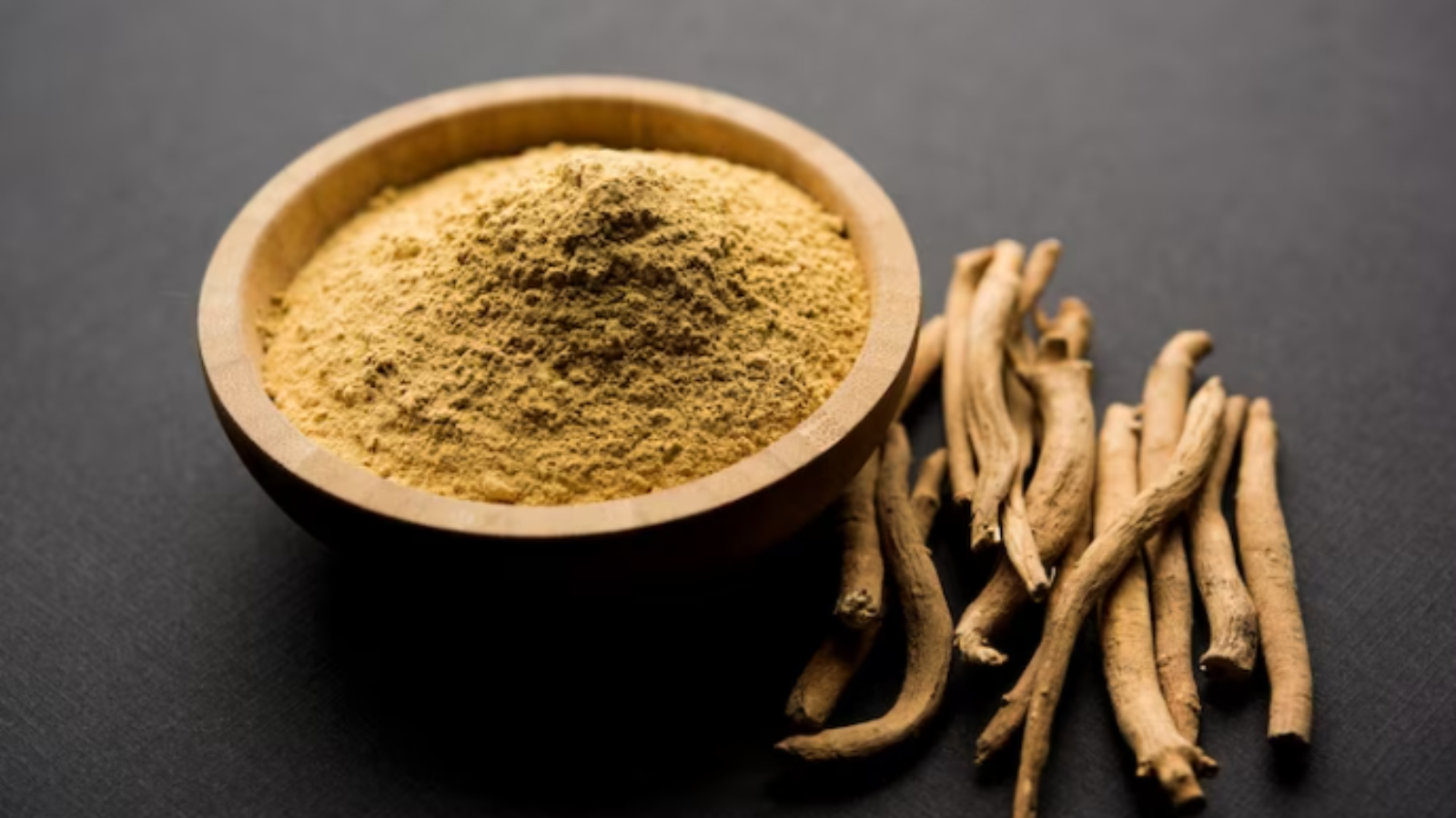 Premium-Photo-Photo-ashwagandha-or-aswaganda-or-indian-ginseng-is-an-ayurveda-medicine-in-stem-and-powder-form-isolated-on-plain-background-selective-focus