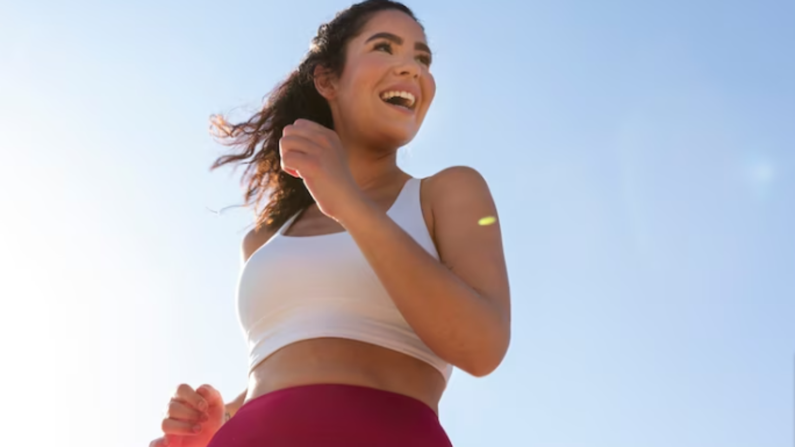 Free-Photo-Free-photo-low-angle-smiley-woman-running