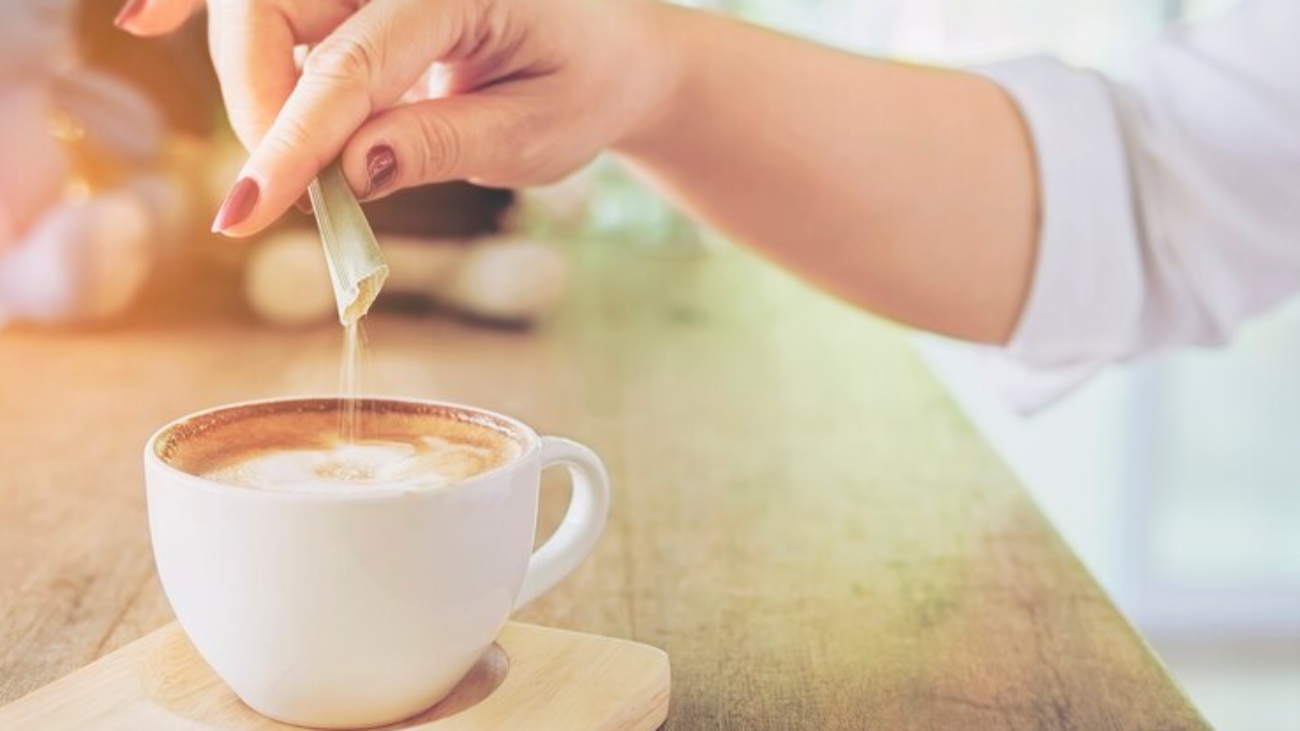 closeup-lady-pouring-sugar-while-preparing-hot-coffee-cup_1150-6487-jpg-740×493- 2