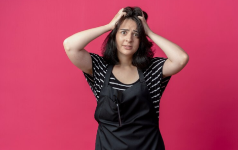 young-beautiful-female-hairdresser-apron-confused-holding-her-head-pink_141793-58816-jpg-740×521-