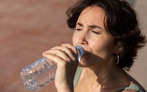 elder-woman-struggling-with-high-temperature_23-2149456746-jpg-740×493-