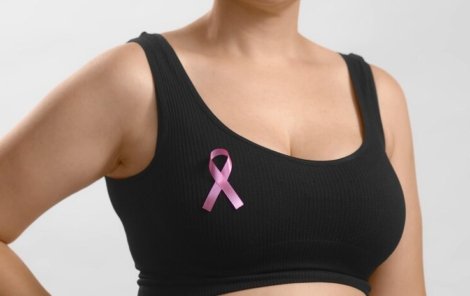 young-european-lady-black-top-standing-with-ribbon-sign-her-chest-support-pink-october-females-combating-breast-cancer-anonymous-studio-shot-high-quality-photo-white-background_633478-510