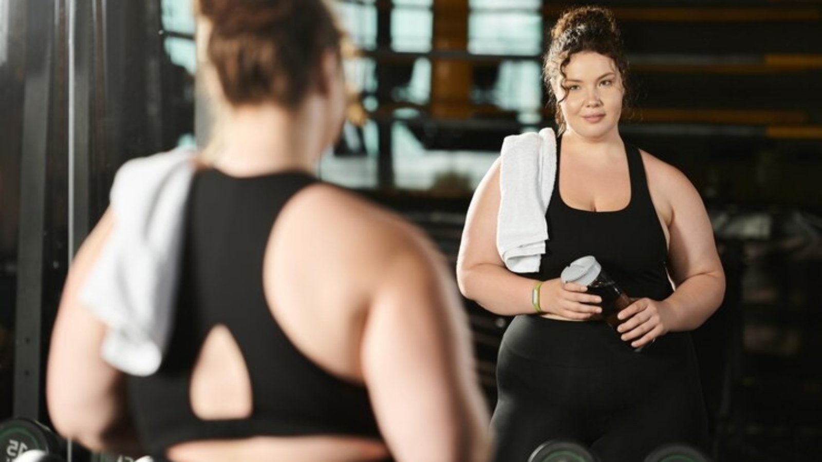 young-woman-confidently-exercising-gym-while-embracing-her-body-positivity_1326977-411