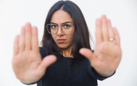 scared-upset-woman-making-stop-gesture_74855-3672
